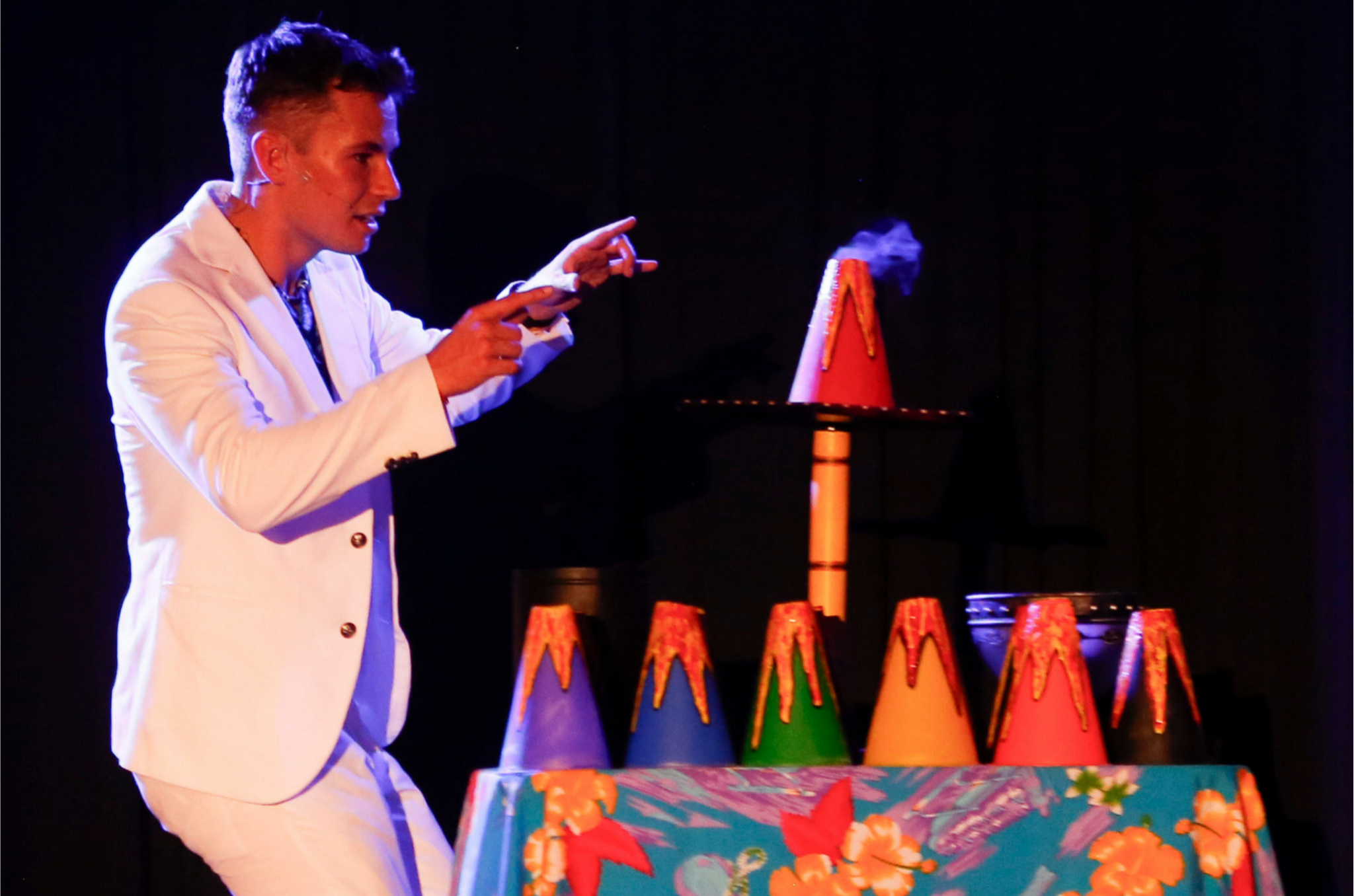 Josiah performing erupting volcanoes on stage